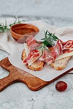 Slices of bread with spanish serrano ham