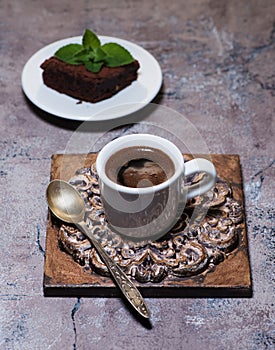 Slices brownies chocolate cake and cup espresso coffee