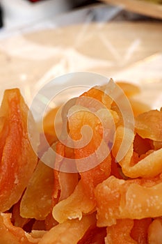 Slices of candied fruit, papaya