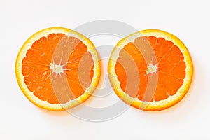 Slices of the cara cara oranges with its pinkish red color inte photo