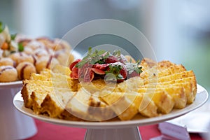 slices of cassava cake on a tray photo