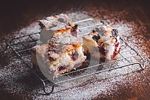 Slices of cherry cake on a cooling hatch