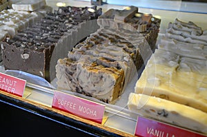Slices of chocolate and vanilla fudge at a candy shop