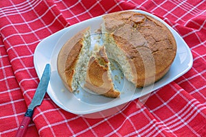 Slices of cornbread on white plate