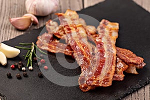 slices of crispy hot fried bacon