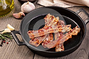 slices of crispy hot fried bacon