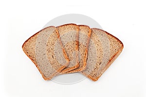 Slices of dark rye bread on white background