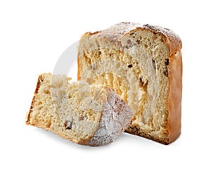 Slices of delicious Panettone cake with powdered sugar on white background. Traditional Italian pastry