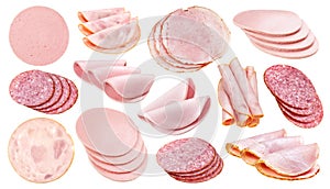 Slices of different sausage, ham and salami isolated on white background