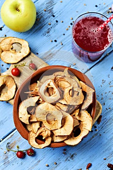 Slices of dried apple served as appetizer or snack
