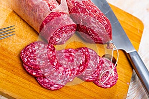 Slices of dry-cured sausage from Iberian pork seasoned with natural marinades