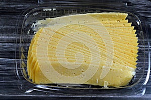 Slices of Egyptian Rumi cheese, also called gebna romiya or gebna turkiya, Roumi, Romi also Romy, middle Eastern parmesan hard