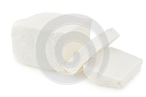 Slices feta cheese isolated on white background. Clipping path and full depth of field