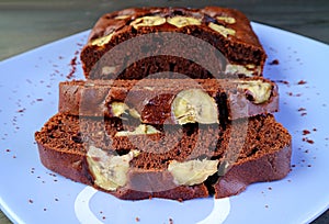 Slices of Flavorful Fresh Baked Homemade Dark Chocolate Banana Cake on a Plate