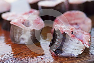 Slices of fresh fish on market