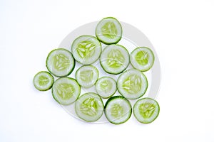 Slices of fresh green cucumber. isolated white background