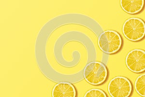 A slices of fresh juicy yellow lemons. Texture background