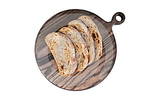 Slices of fresh rye bread on a wooden board