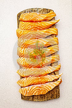 Slices of fresh salmon. Ingredient for cooking healthy seafood. Concept omega 3 containing food