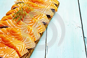 Slices of fresh salmon. Ingredient for cooking healthy seafood. Concept omega 3 containing food