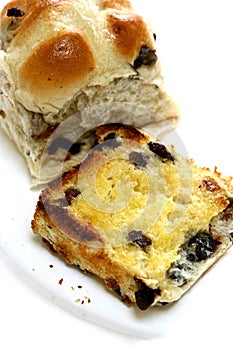 Slices of freshly toasted hot cross buns