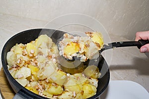 Slices of fried potato with pork