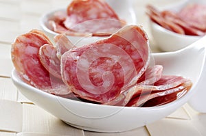 Slices of fuet, spanish cured sausage
