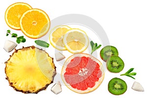 slices of grapefruit, kiwi fruit, orange and pineapple isolated on white background top view healthy background