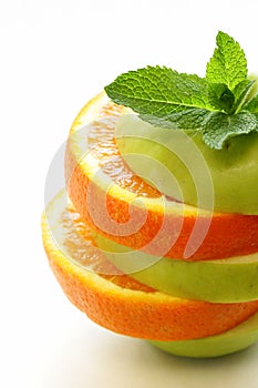 Slices green apple and orange