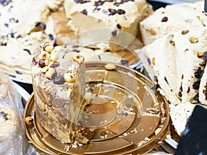Slices of Halva with peanut and walnut. Traditional middle east dessert