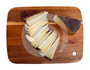 Slices of hard cheese Anejo from sheep milk photo