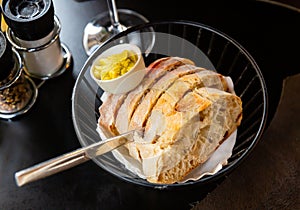 Slices of home baked white bread and fresh butter