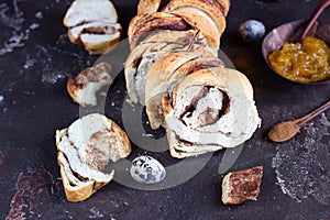 Slices of homemade cinnamon babka or swirl brioche bread. Cinnamon roll bread. Povitica: traditional Polish sweet bread.