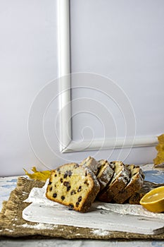 Slices of homemade raisin cake with black tea. Raisin bread cake. Breakfast concept. Rustic style. autumn still life