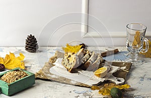 Slices of homemade raisin cake with black tea. Raisin bread cake. Breakfast concept. Rustic style. autumn still life