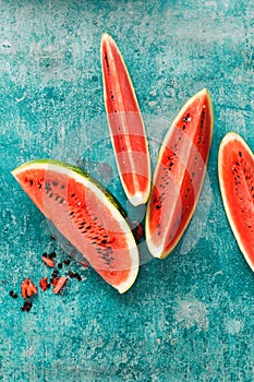 Slices  of juicy watermelon on a rustic background