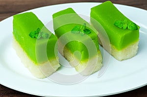 Slices of kuih Talam or Pandan Tray Cake photo