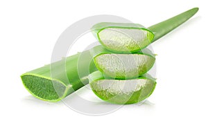 Slices and leaf of Aloe vera plant on white background. Natural ingredient for herbal beauty product, cosmetology,