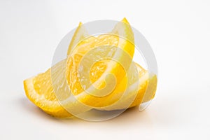 Slices of lemon citrus fruit isolated on white background. Lemon slice with shadow