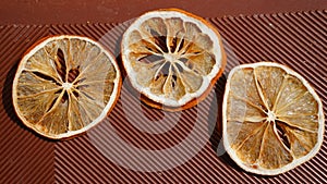 Slices of lemon are dried in the sun
