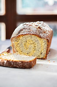 Slices of lemon pound cake with poppy seeds. Close up