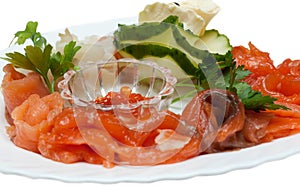 Slices of the lox, red roe, cucumber