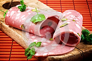 Slices of Mortadella photo