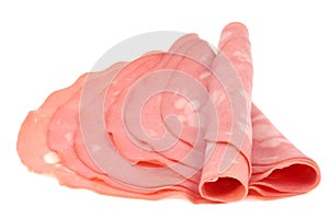 Slices of mortadella on a white background