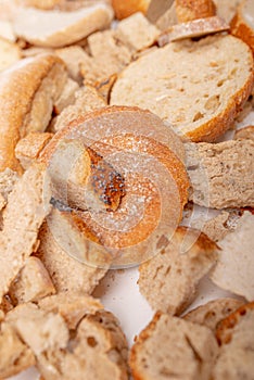 Slices of old, dry bread. Intended for a breadcrumbs of for the cattle. Dryied bread