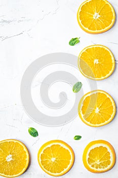 Slices for orange juice on white background top view mock-up