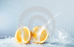 Slices of orange thrown water