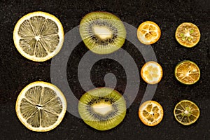 Slices of oranges, lemon and kiwi