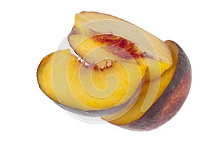 Slices of peach isolated in white