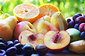 slices of peach, pears and grapes